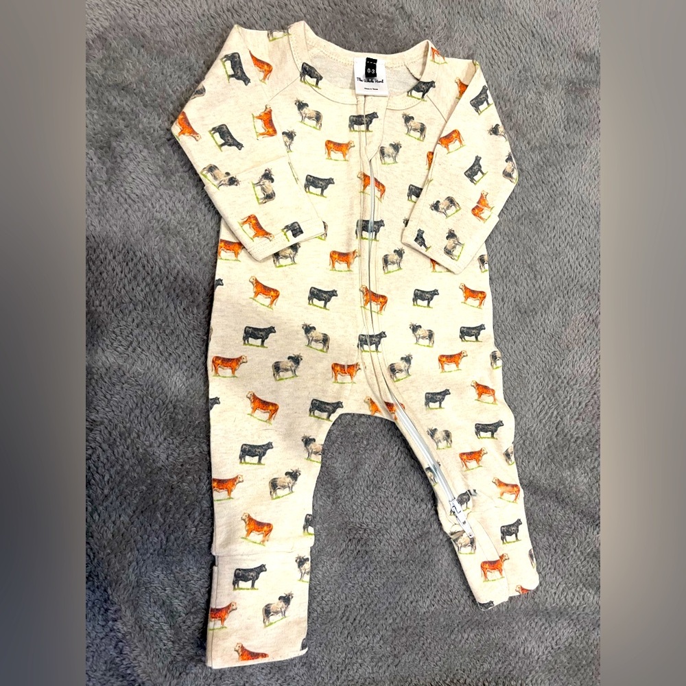 Texas cattle sleep and play with cuffs. 0-3months